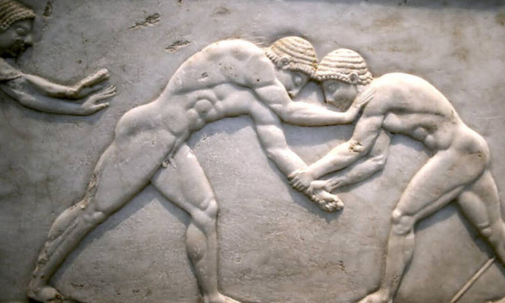 Ancient marble tablet showing Greek fight